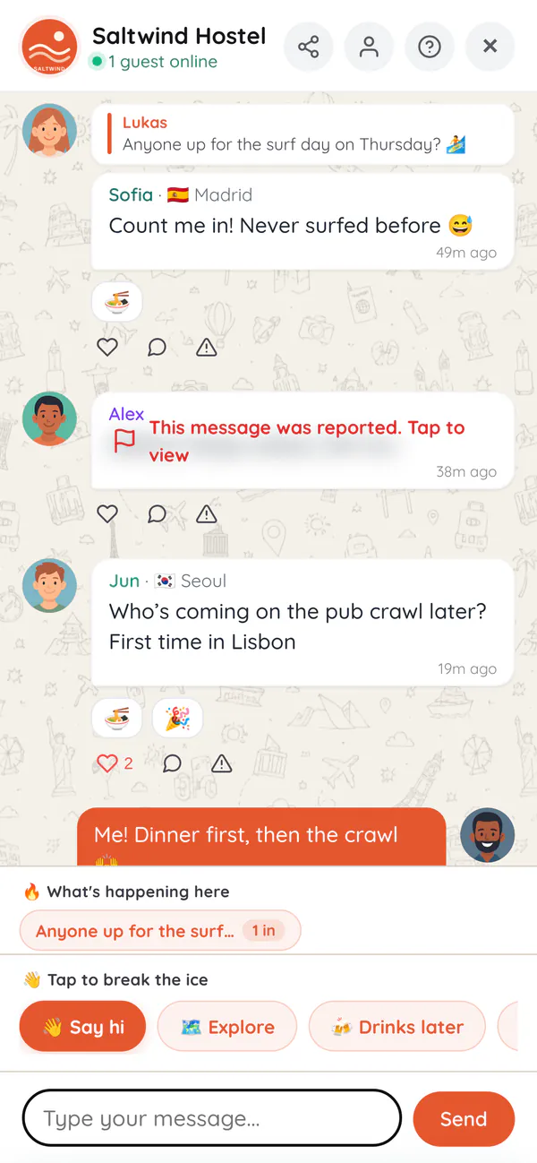 The FreeGuides guest group chat at the demo Saltwind Hostel: guests planning a surf day and the pub crawl, shared interests under each message, and a reported message hidden for everyone
